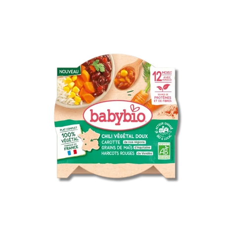 Chili végétal doux Babybio avec carotte, maïs, haricots rouges et paprika dans un bol, présenté dans un emballage de 230g.