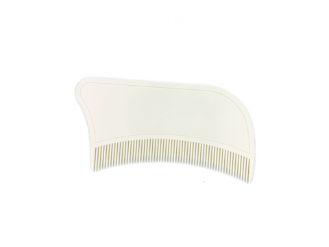 Peigne anti-poux Néobulle pour éliminer les poux, avec dents fines pour un traitement efficace, en plastique blanc.