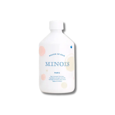 Mousse de bain pour enfant Minois Paris, visage et corps, texture douce et aérienne pour peau sensible.