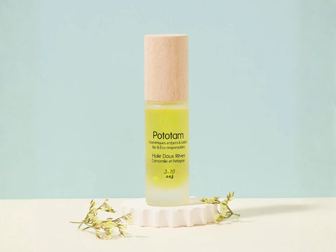 Huile Doux Rêves Pototam à la camomille et petitgrain pour visage et corps, massage relaxant du soir, flacon avec bouchon.