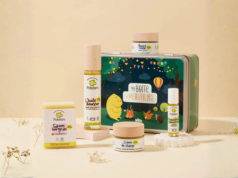 Coffret Pototam Merveilles pour soin complet bébé dès la naissance, comprenant plusieurs produits pour la peau de bébé.