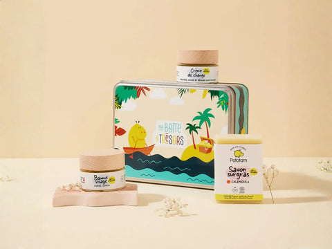 Coffret Pototam Trésors l'Essentiel Soin Bébé dès la naissance, comprenant plusieurs produits de soin pour bébé dans une boîte élégante.